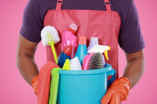Cleaner working in a Kennington period home kitchen